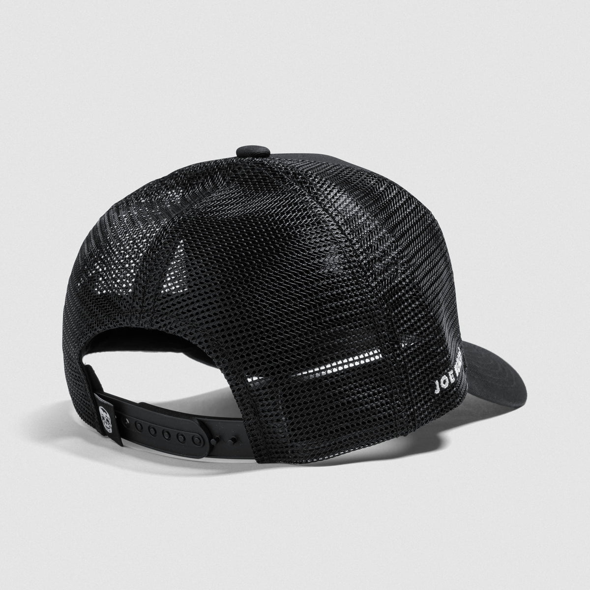 Back angle view of the Signature 5-Panel Trucker Hat displaying the adjustable notches for a personalized fit