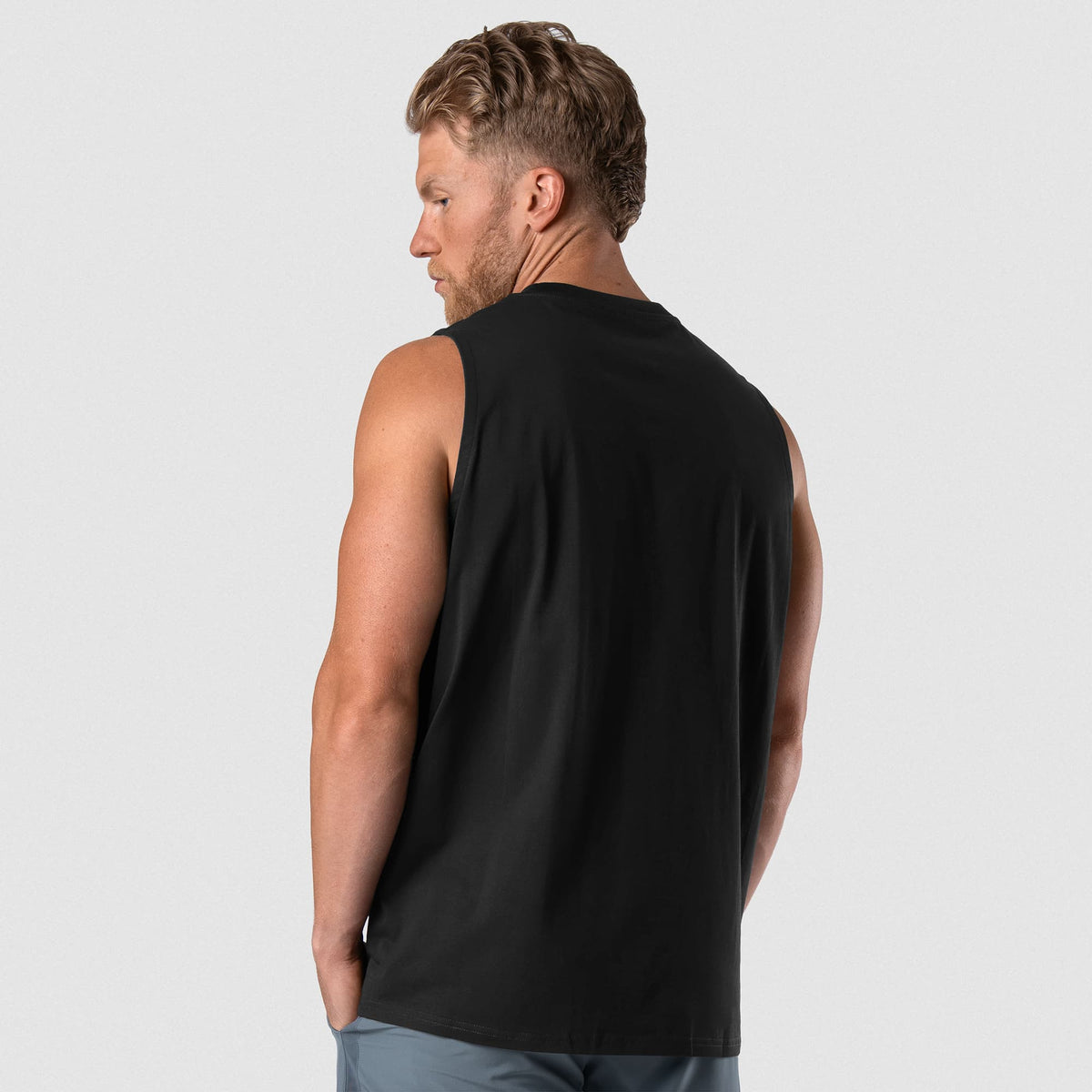 Man wearing Axis Muscle Tank - Black/White back fit