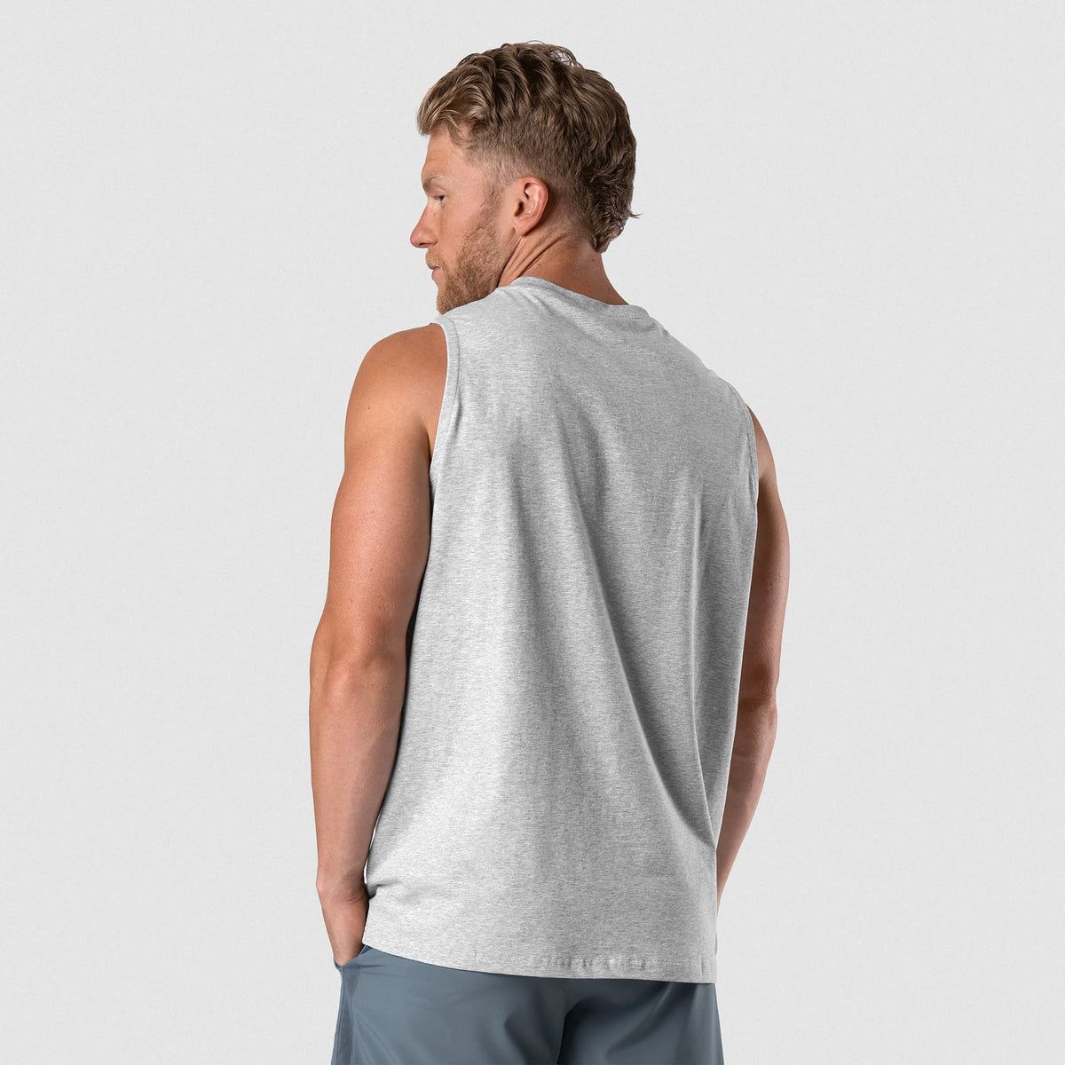 Man wearing Axis Muscle Tank - Heather Gray back fit