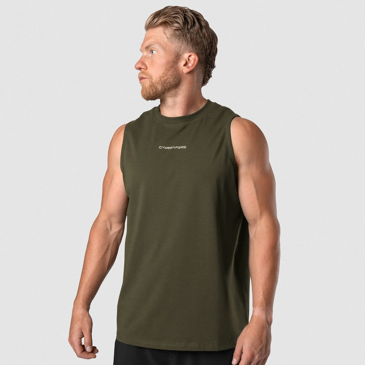 Male model wearing the Axis Muscle Tank - OD Green front view