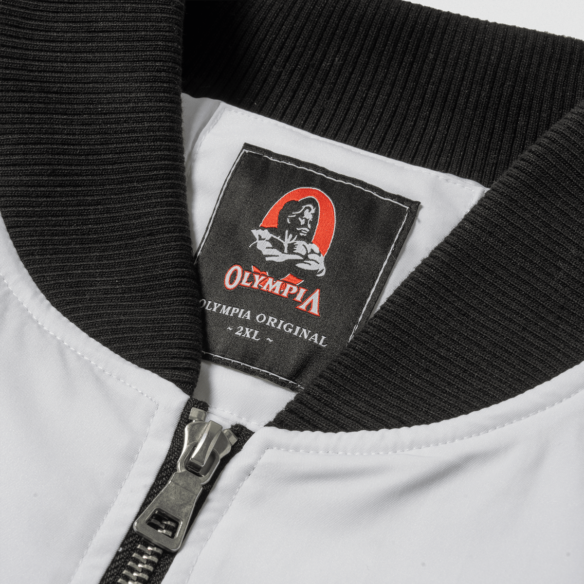 Olympia Signature Bomber Jacket in White – Collar and Zipper Detail