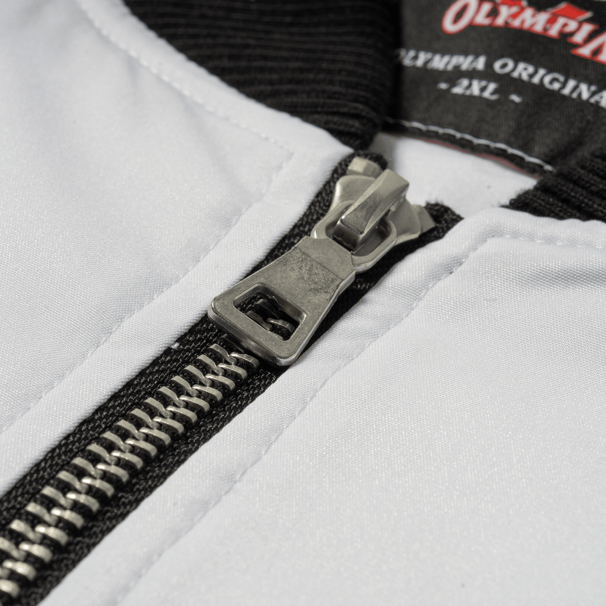 Olympia Signature Bomber Jacket in White – Zipper Pull Detail