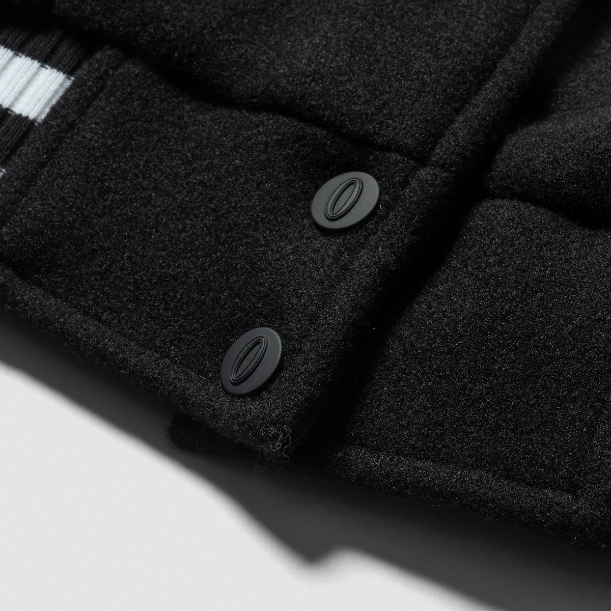 Signature Crop Varsity Jacket | Bottom "O" branded Olympia buttons for secure closure