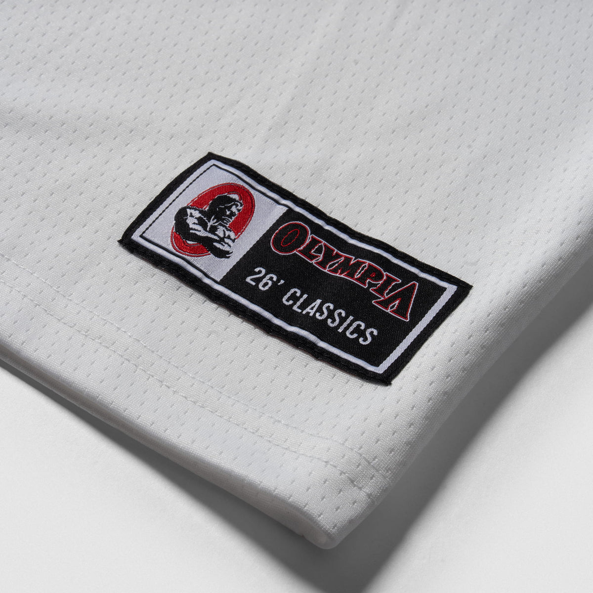 Signature Jersey | Olympia branded jersey tag detailing
