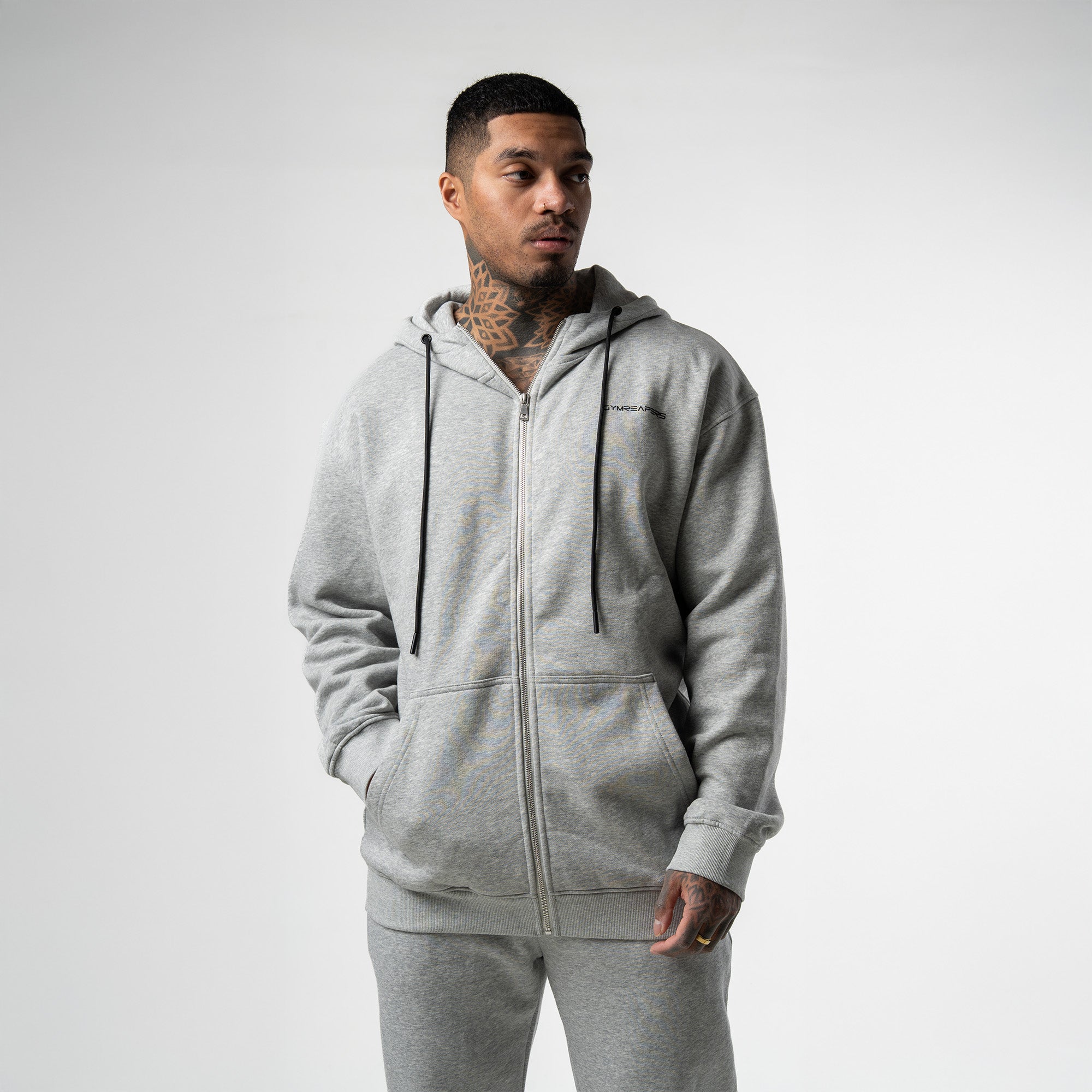 athlete wearing gray axis zip up