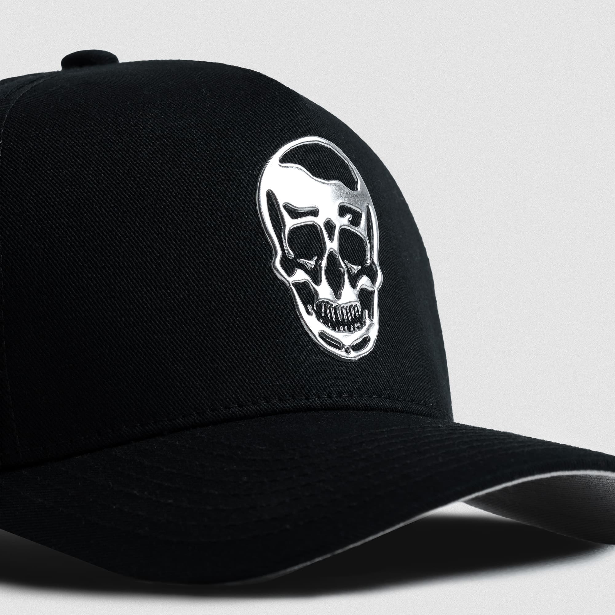 5-Panel Chrome Skull Hat close up shot of logo