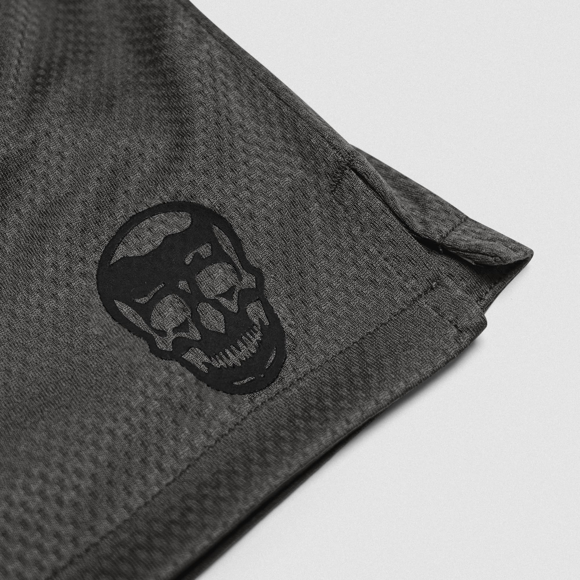 Storm Core Skull Mesh Training Shorts lay flat close up shot of logo