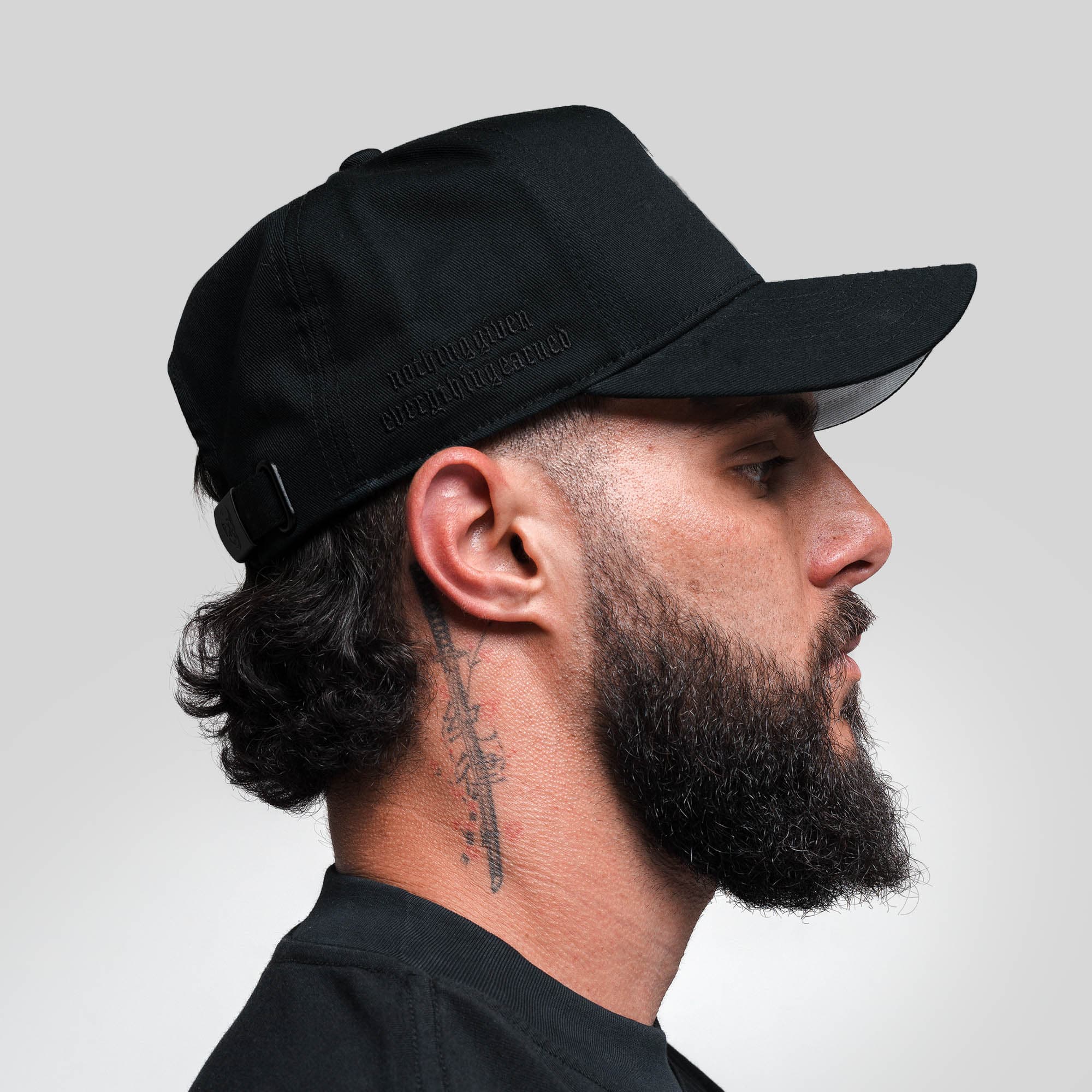 Athlete wearing 5-Panel Chrome Skull Hat side view