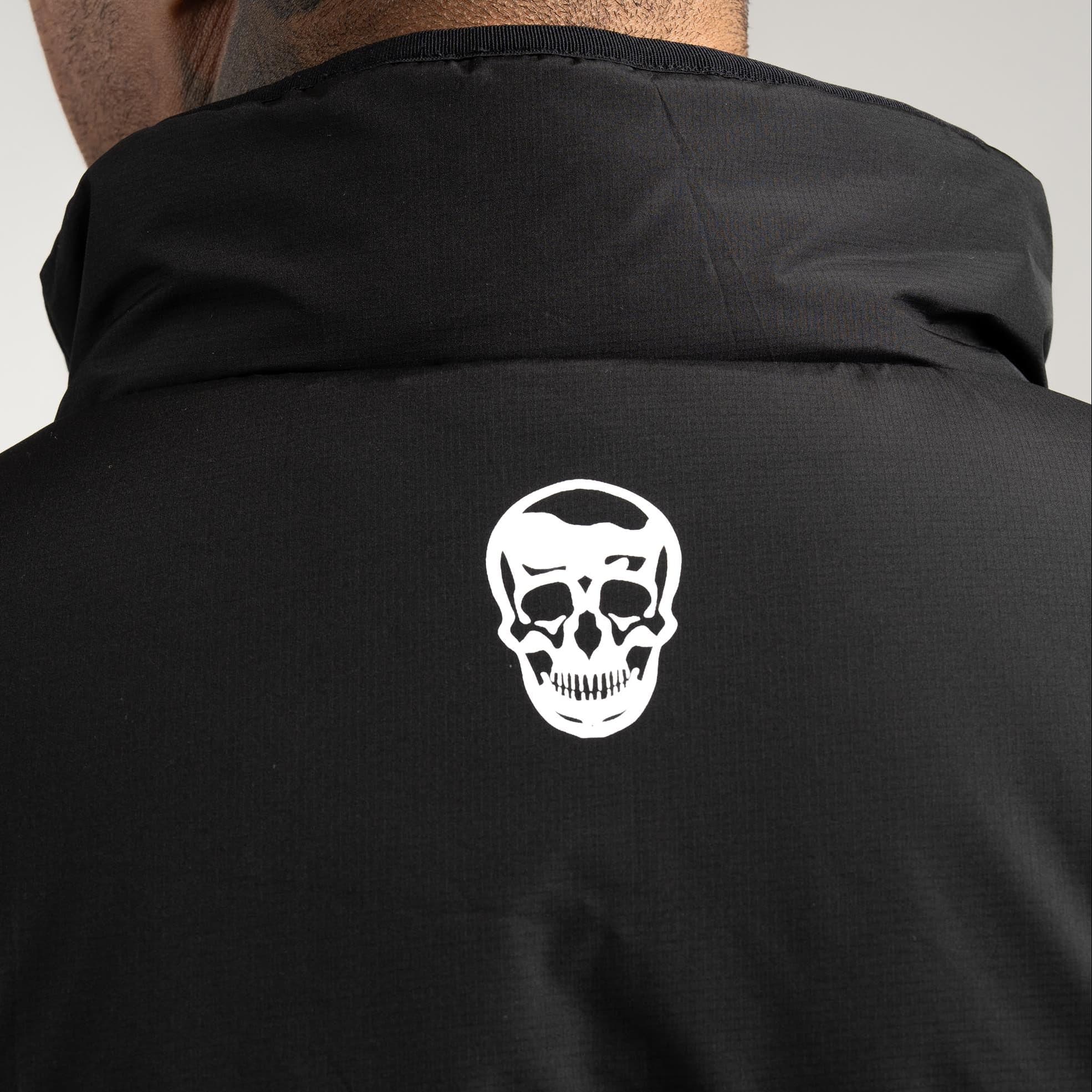 athlete wearing the Arktik Puffer Jacket close up shot of back logo