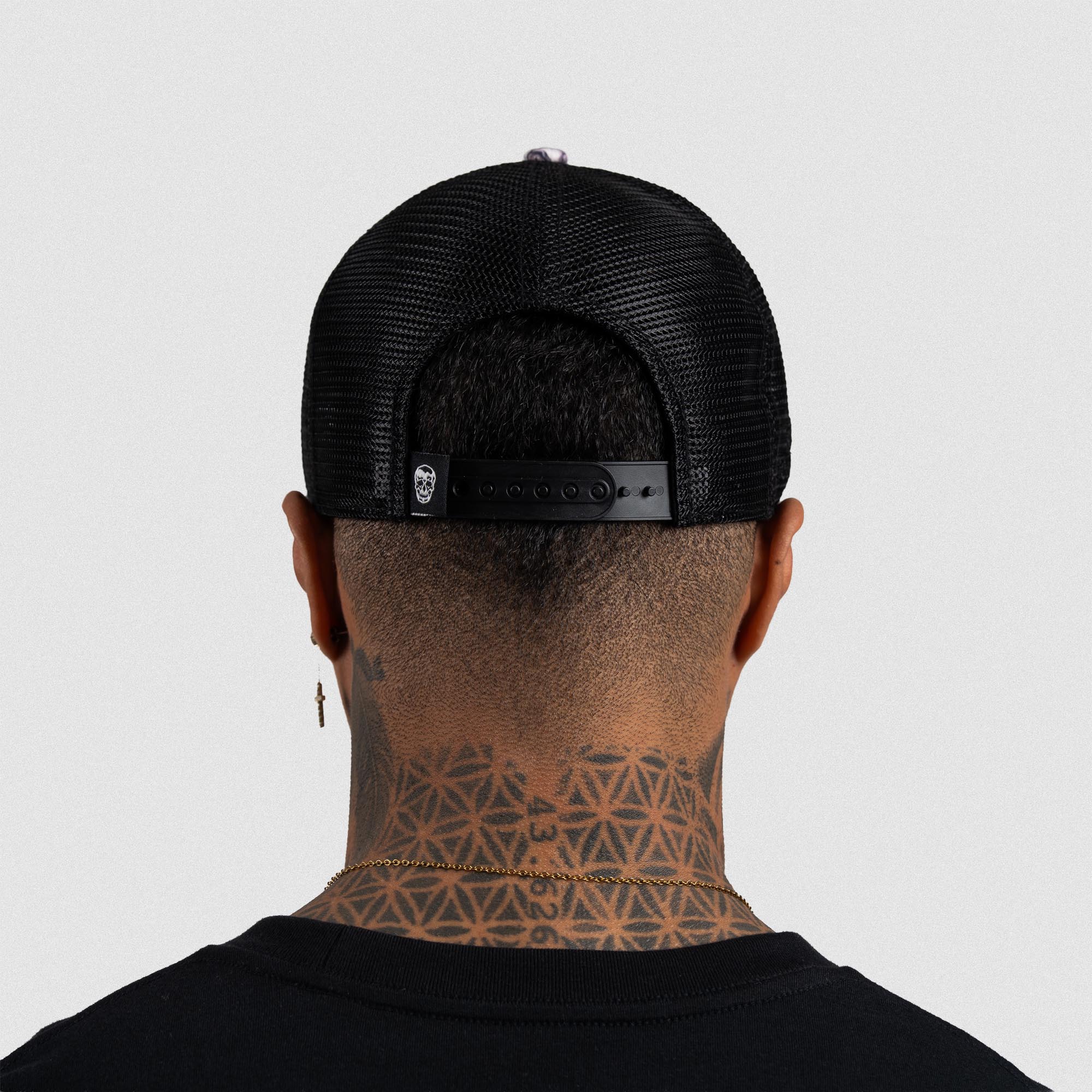 Athlete wearing Camo 5-Panel Initial Trucker Hat back view