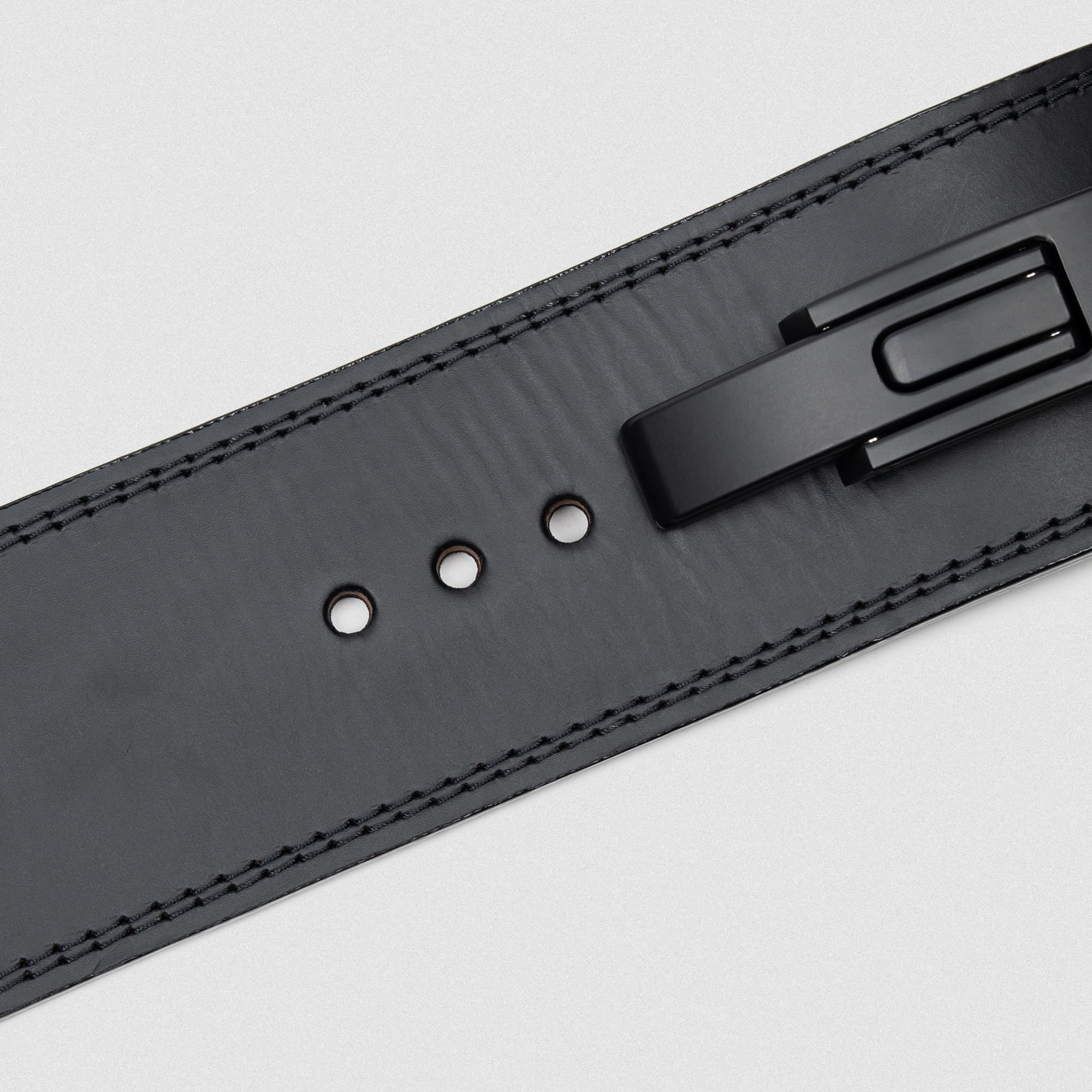 Close up shot of the Black Leather 10mm Lever Belt showcasing the detail in the stitching and lever