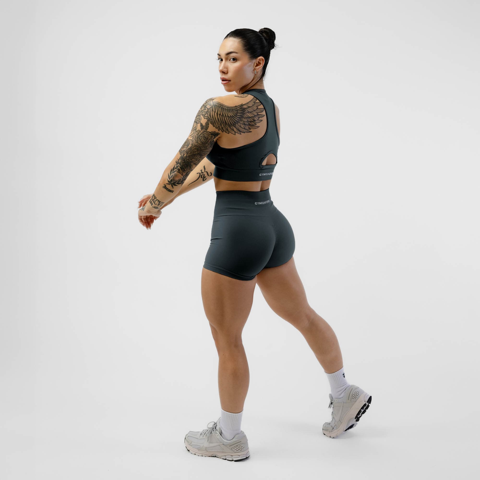 Athlete wearing the Charcoal Halo Shorts full body shot