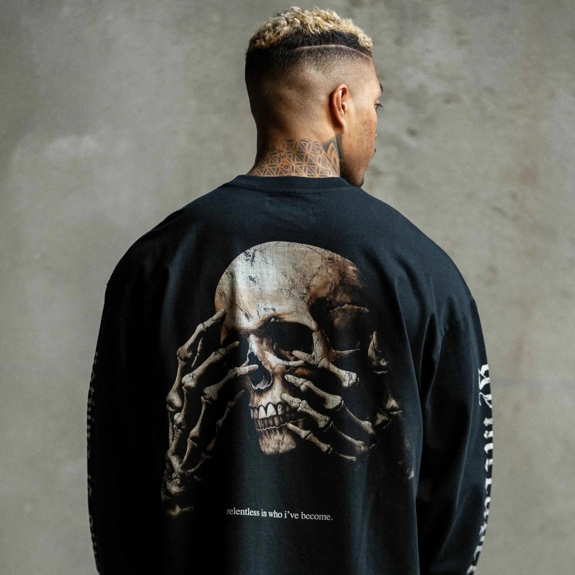 relentless long sleeve shirt back full view concrete background