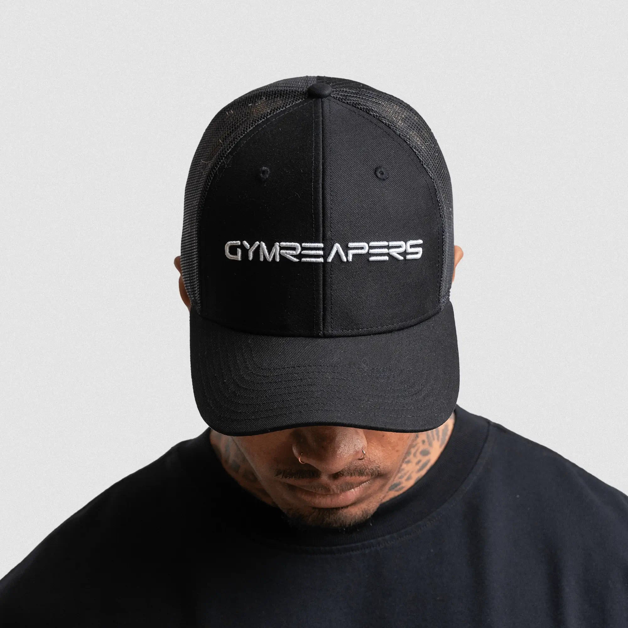 6 panel hat black white on athlete studio gray background front shot