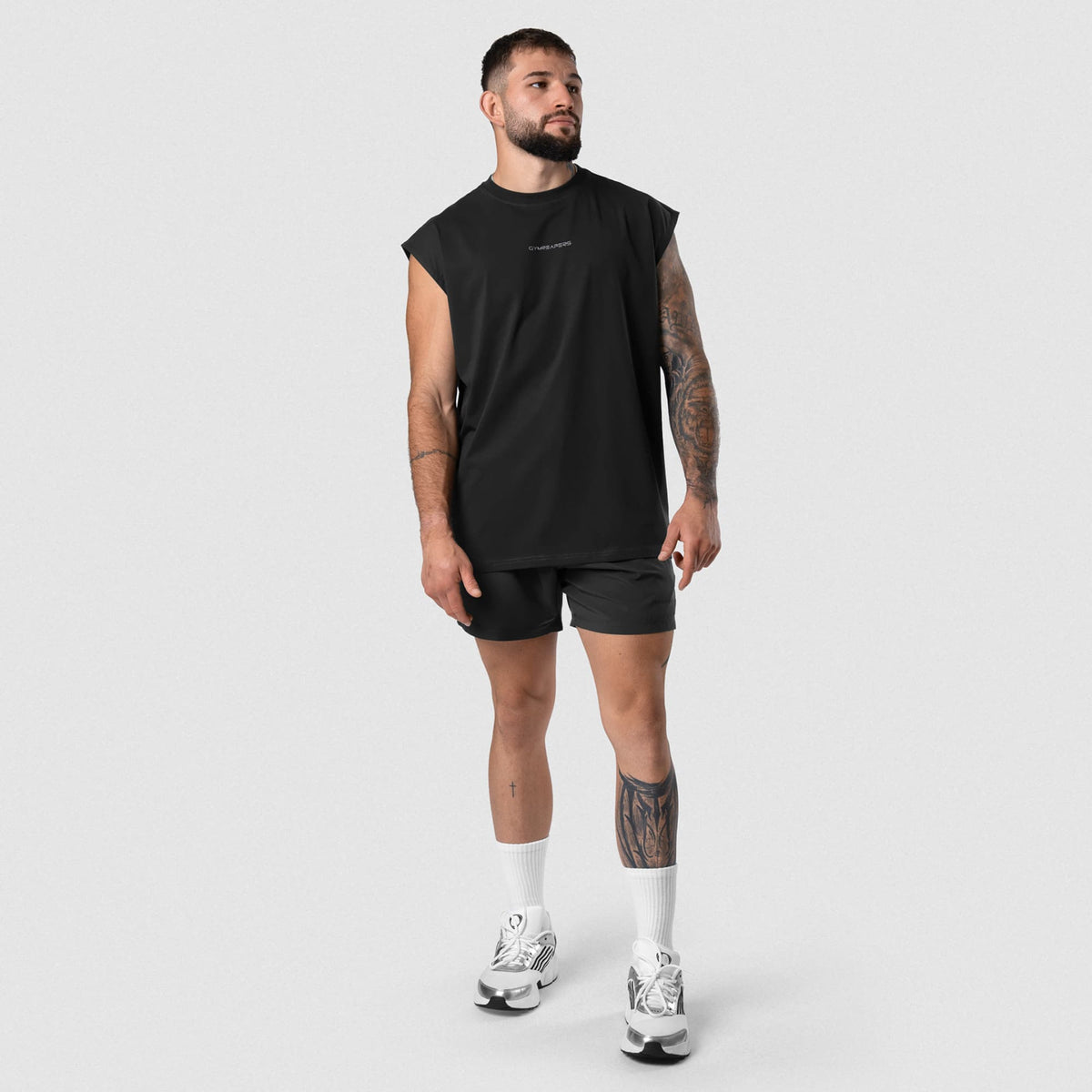 Men wearing Axis Cap Sleeve Tank - Black/White full-body view