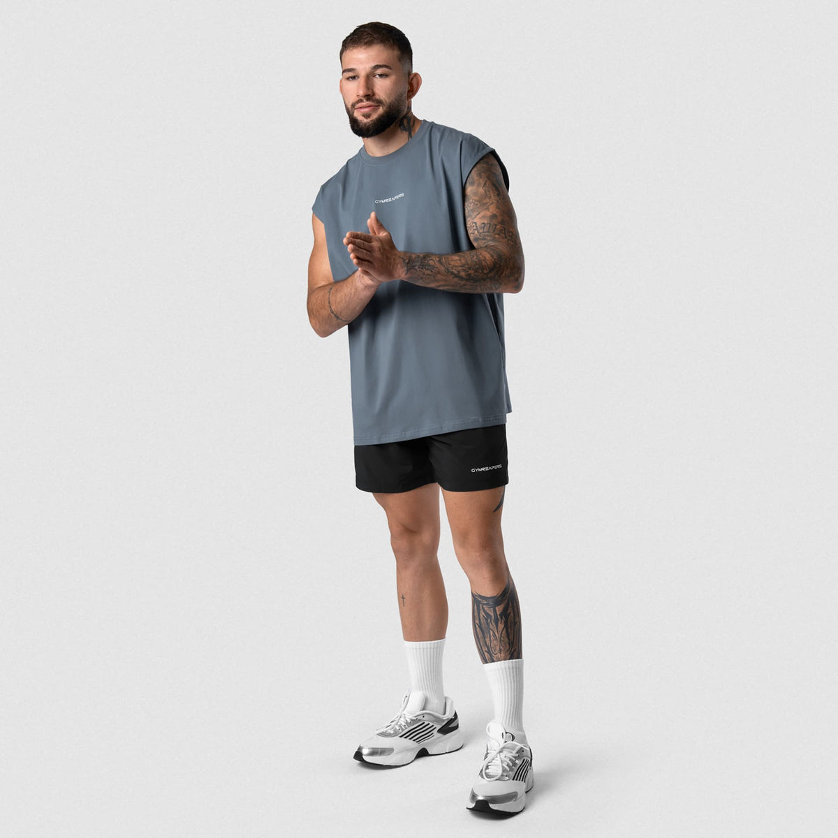 Man wearing Axis Cap Sleeve Tank - Lake full-body front view