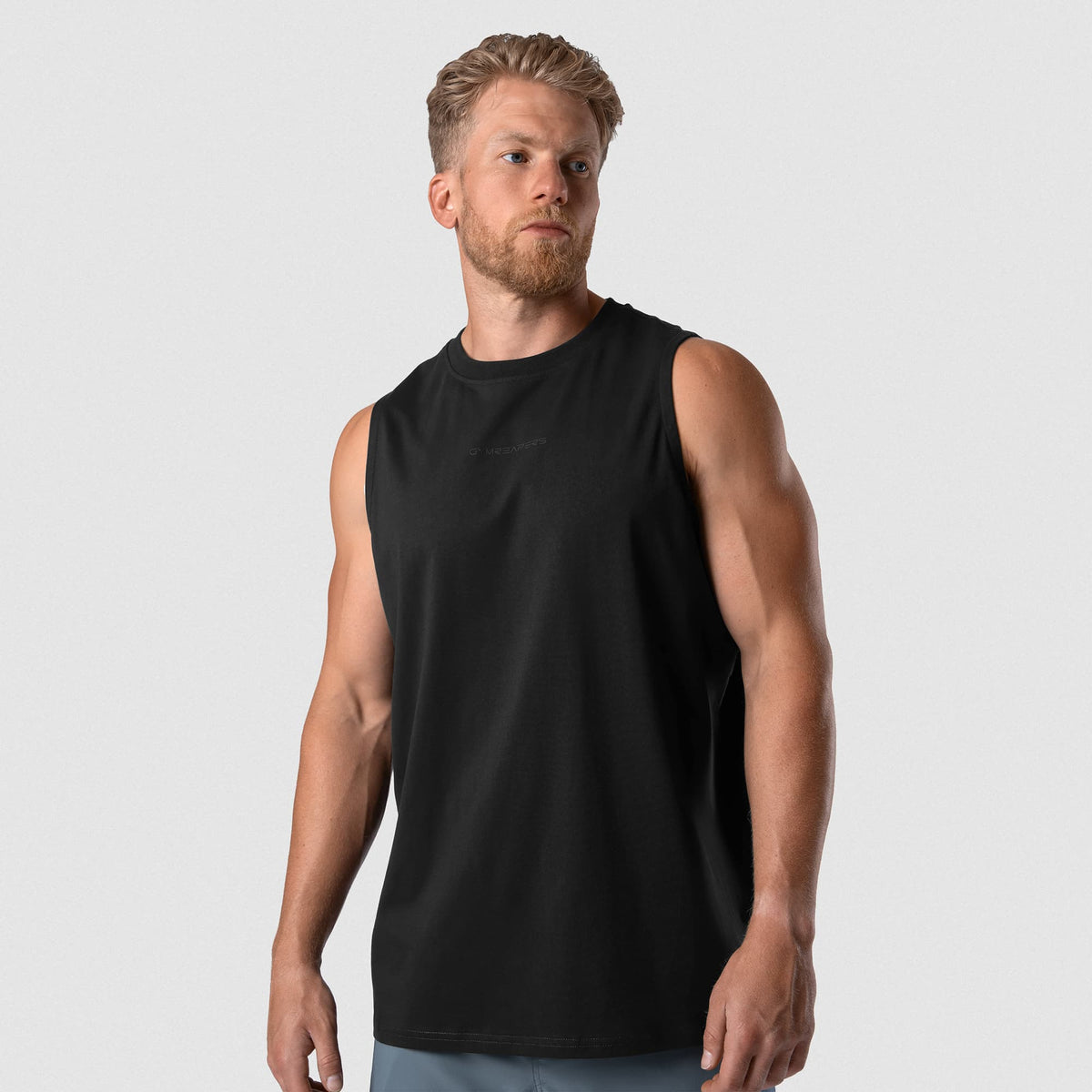 Man wearing Axis Muscle Tank - Black/Black front fit