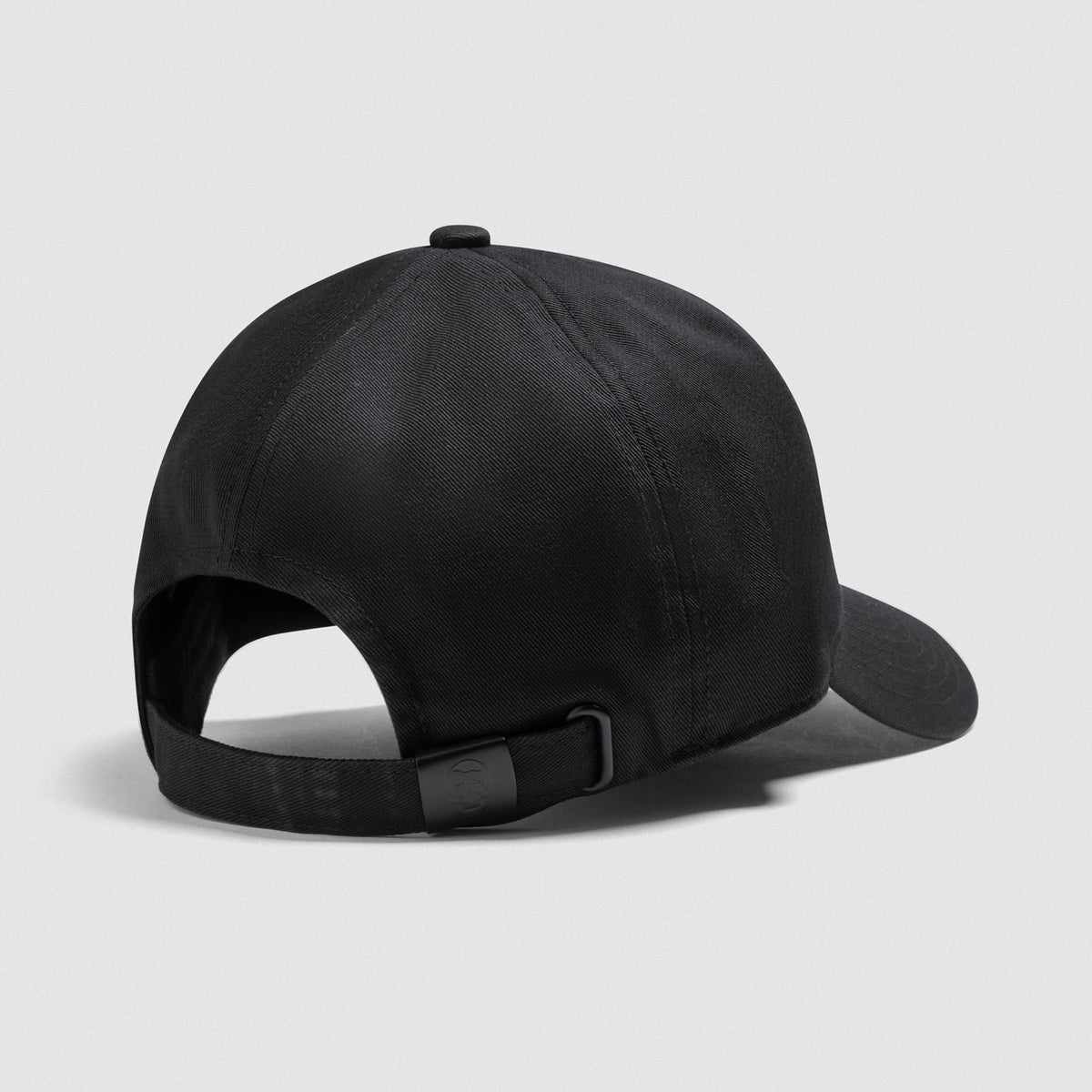 Back angled view displaying the adjustable clasp on the Micro Joe Dad Hat