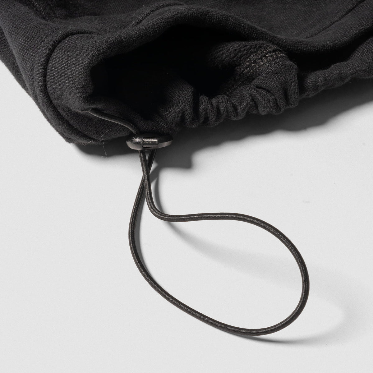 Champions Gold Cropped Zip-Up Hoodie |  Close up of adjustable hem feature