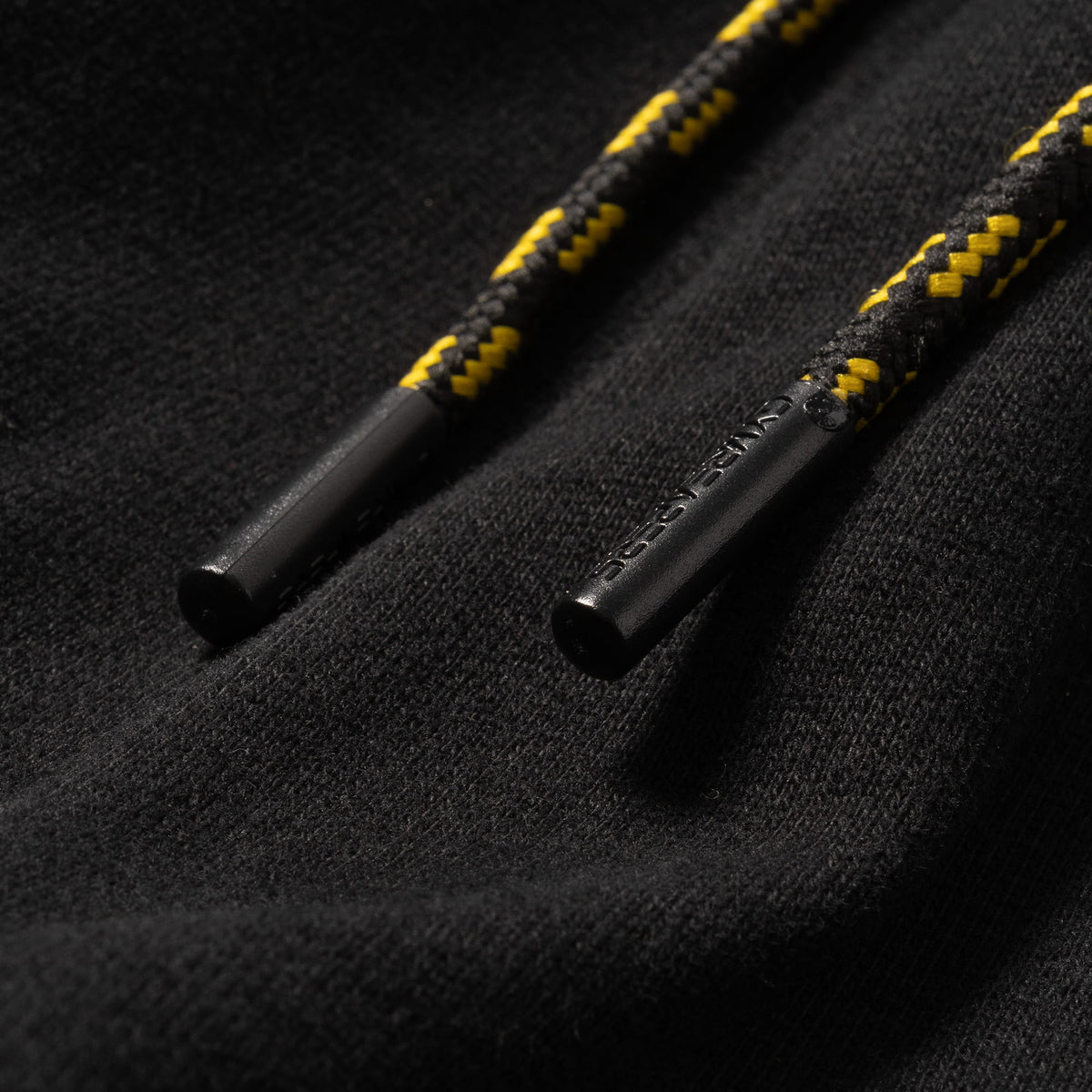 Custom GYMREAPERS drawstrings on the Olympia Champions Gold Jogger 