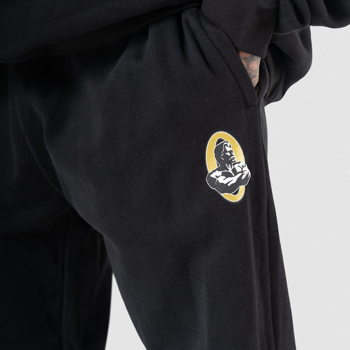 Embroidered graphic Olympia Champions Gold logo on the leg of the Olympia Champions Gold Jogger sweatpants