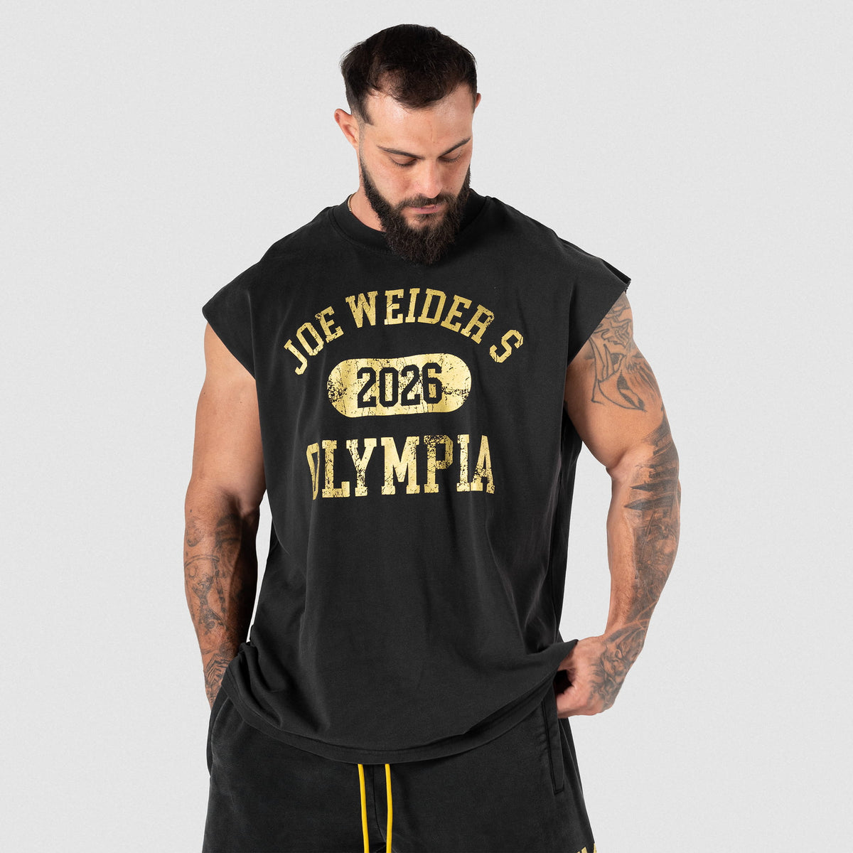 Front view of Male model  wearing the Joes Olympia Cut-Off tank top
