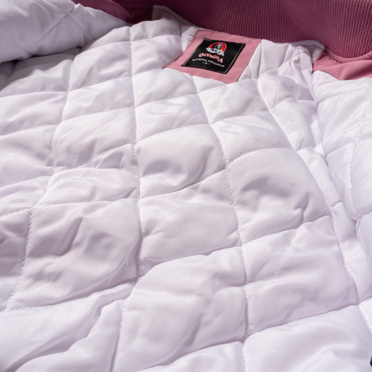 Rose Division Crop Bomber Jacket | White internal lining feature