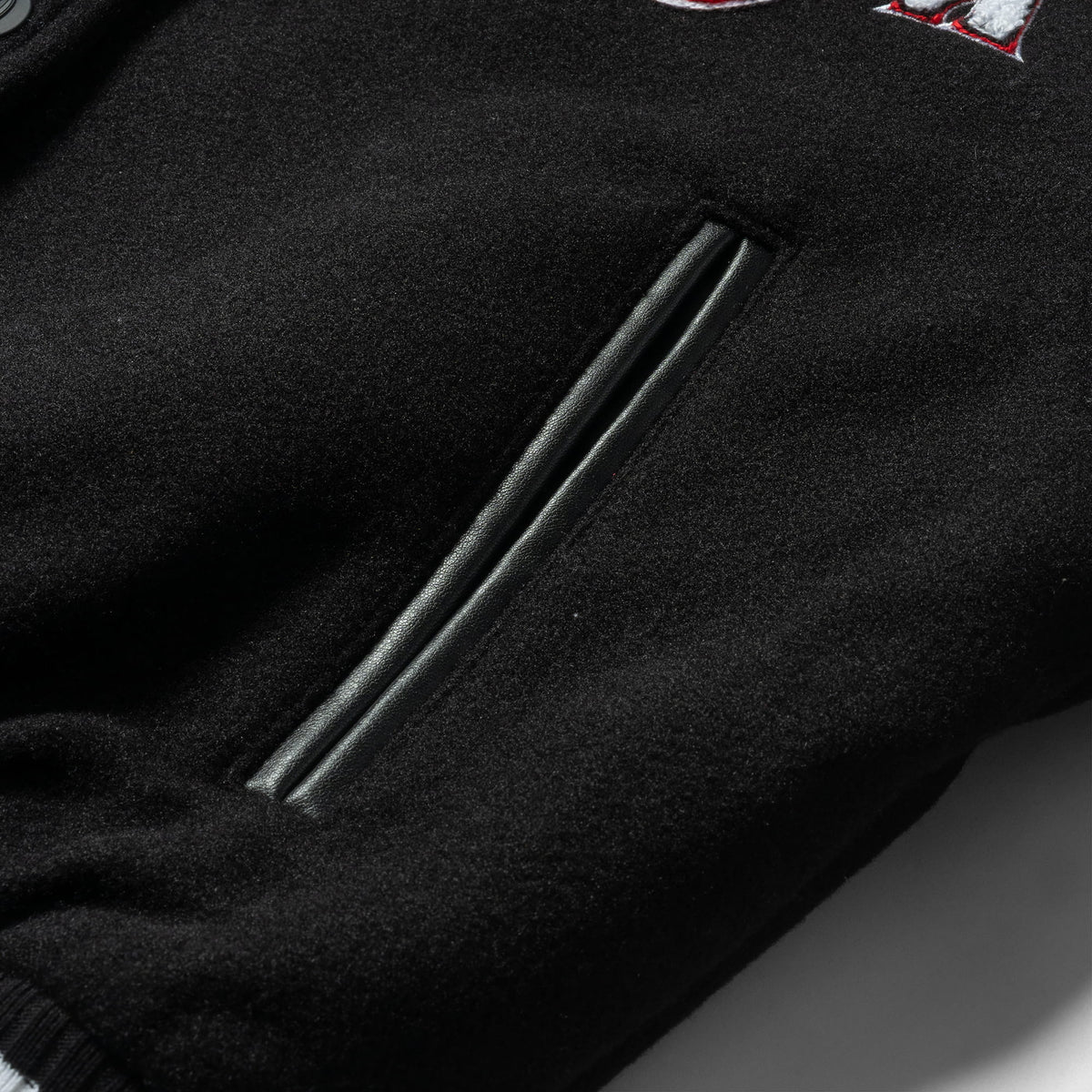 Signature Crop Varsity Jacket | Pocket feature and detailing