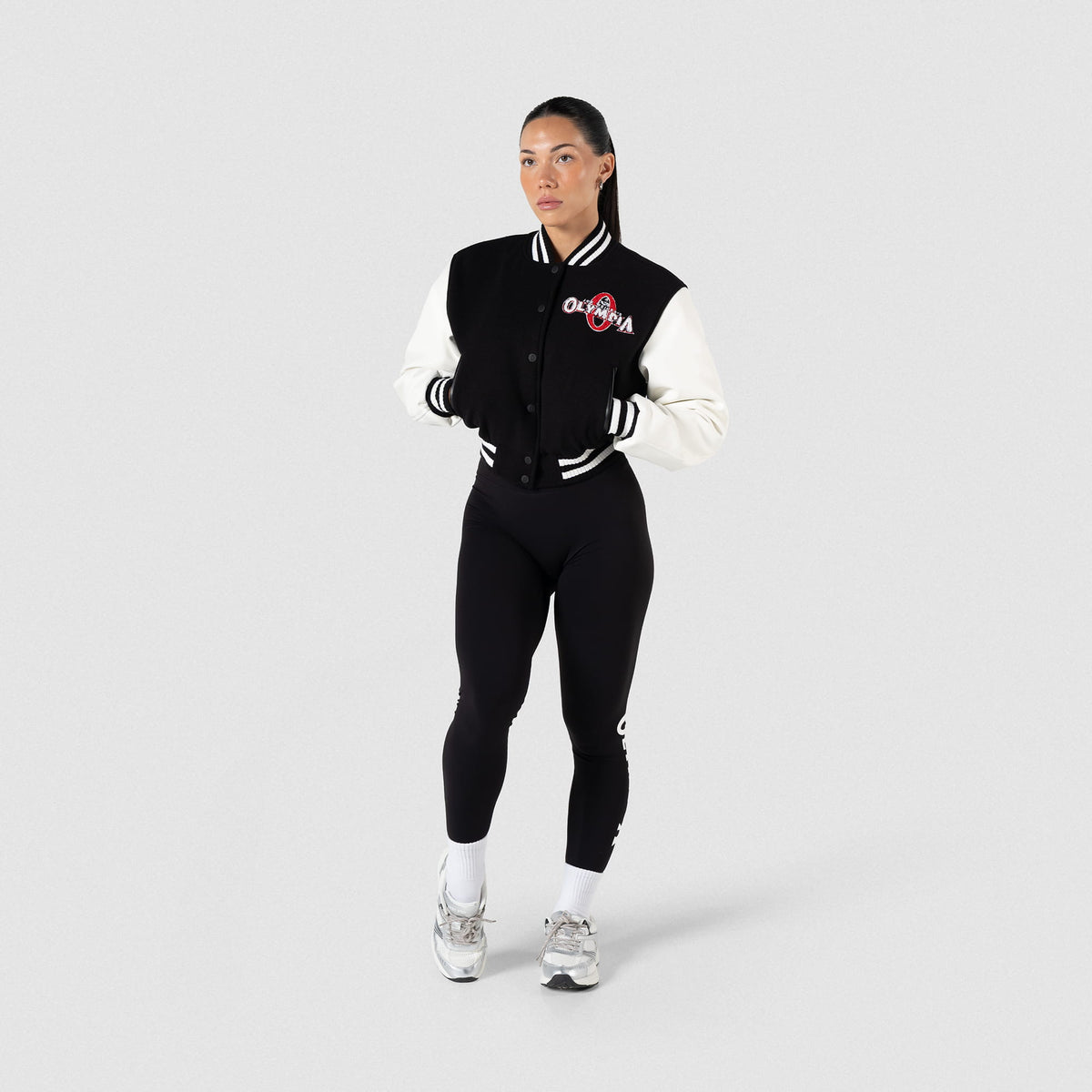 Signature Crop Varsity Jacket | Full body, on model front view with matching leggings