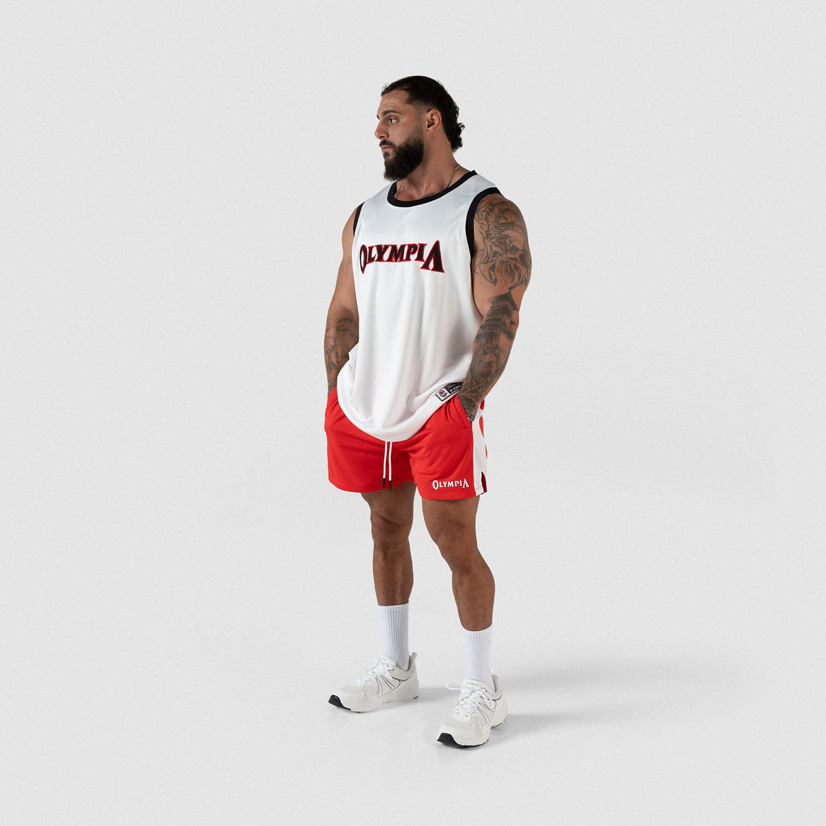 Signature Jersey | Male model full body view wearing jersey with red shorts