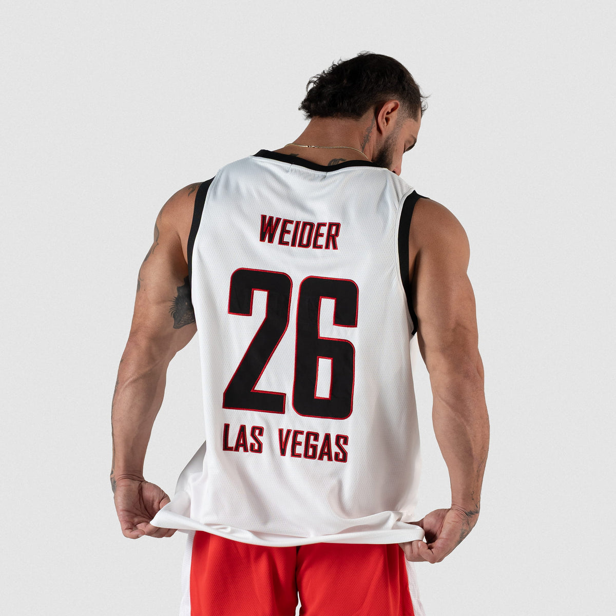 Signature Jersey | Back of jersey on male model showing the large "Weider Las Vegas" wordmark paired with the jersey number "26"