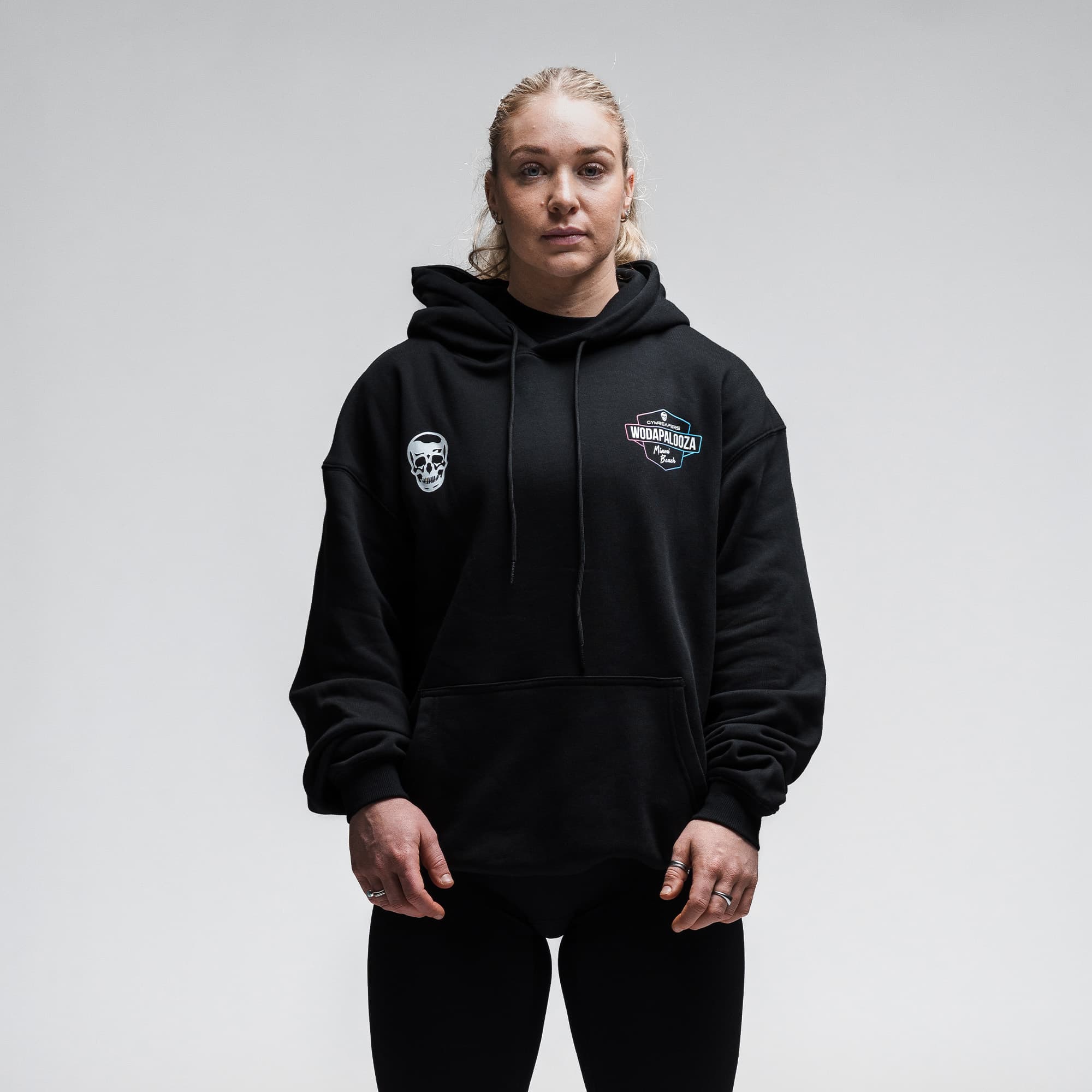 Female athlete wearing the Neon Horizon Hoodie half body shot front view