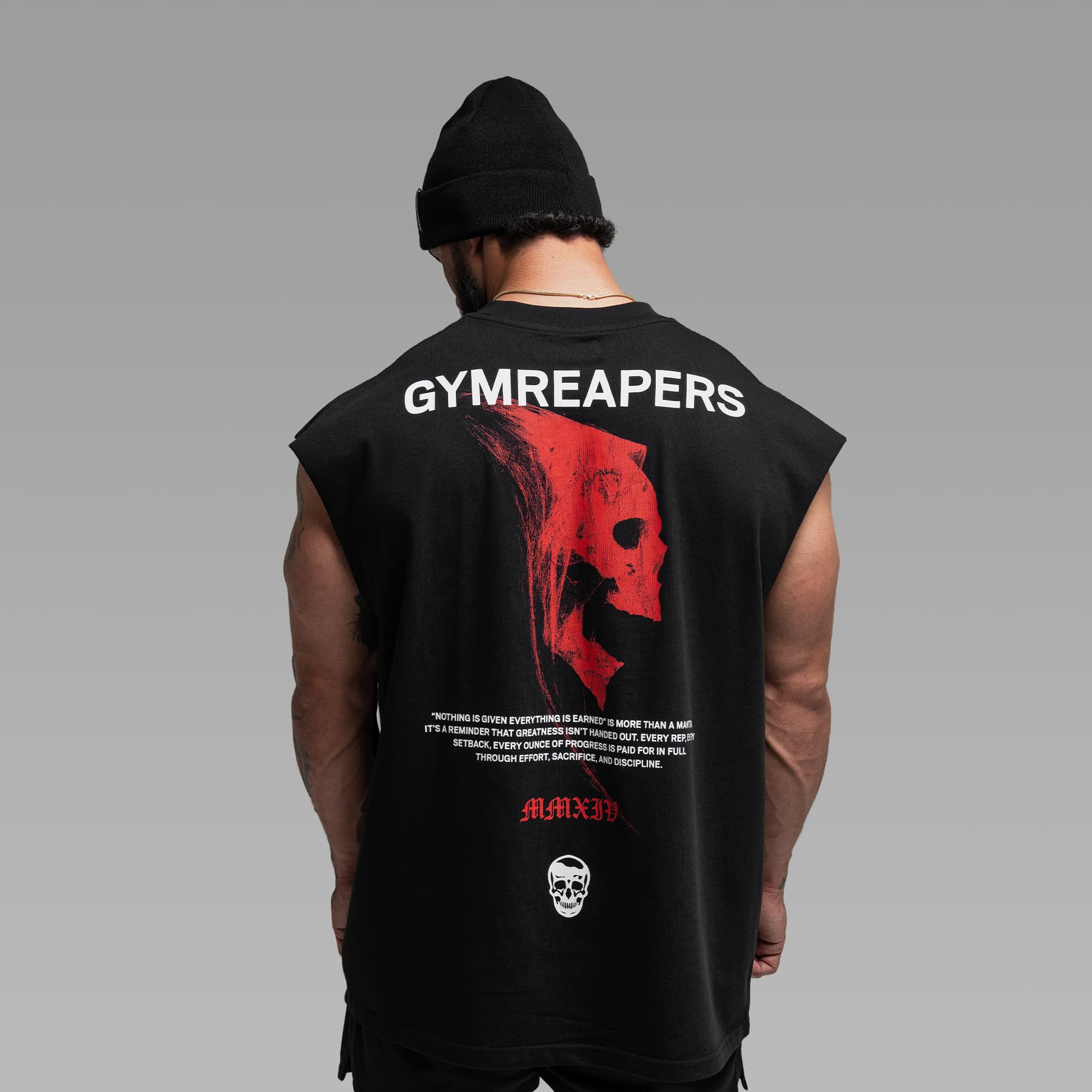 Athlete wearing the Reaper Manifest Cut Off half body shot back view