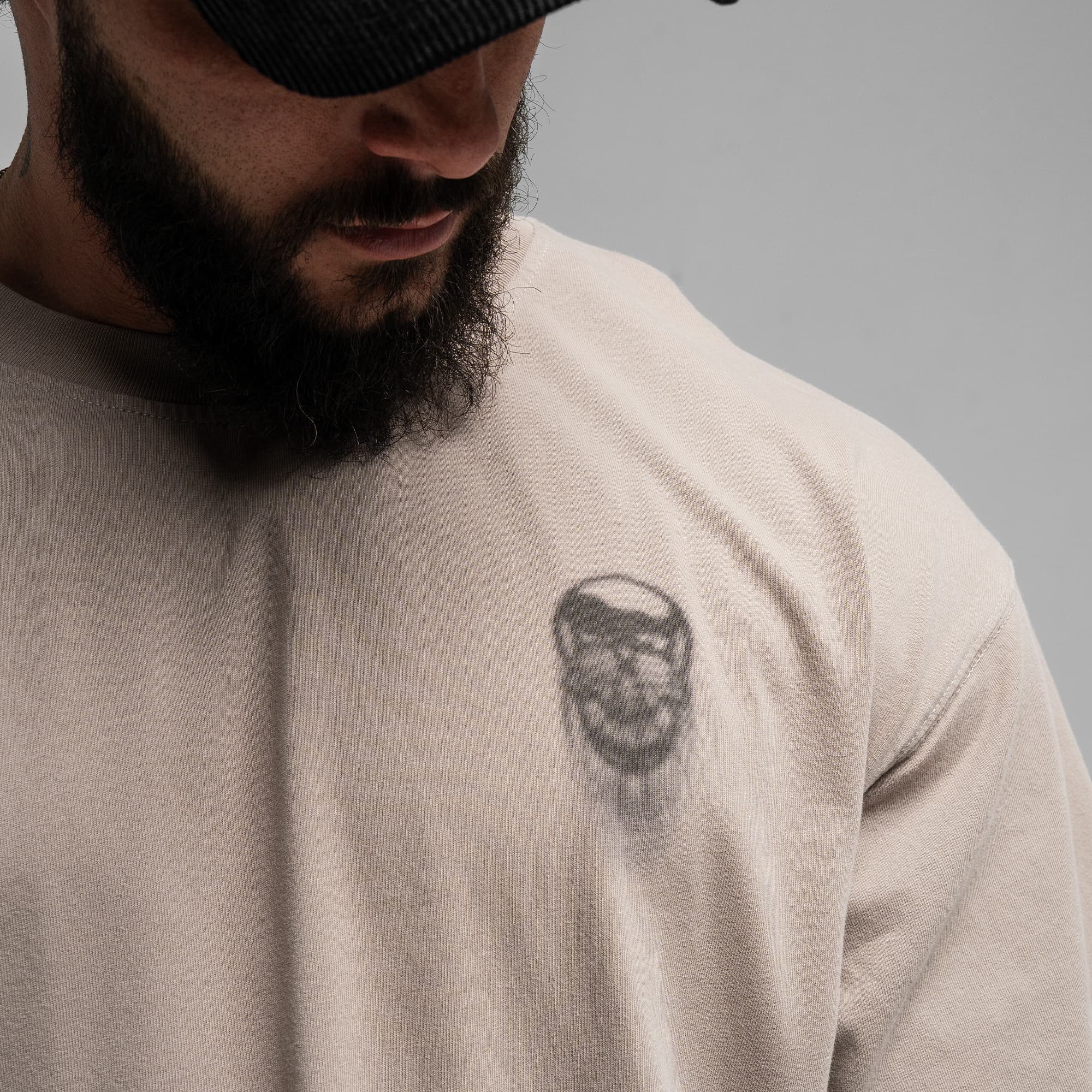 Athlete wearing GR Shadow Tee close up shot of front logo