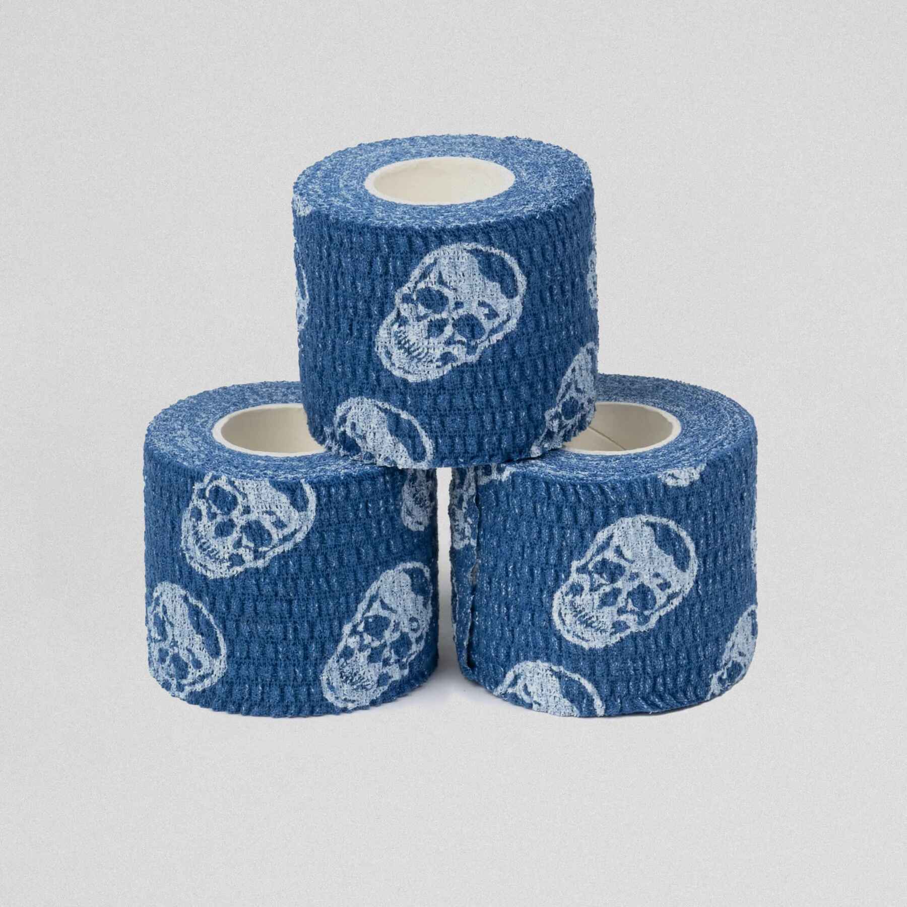 Three pieces of skull tape stacked on top of each other.