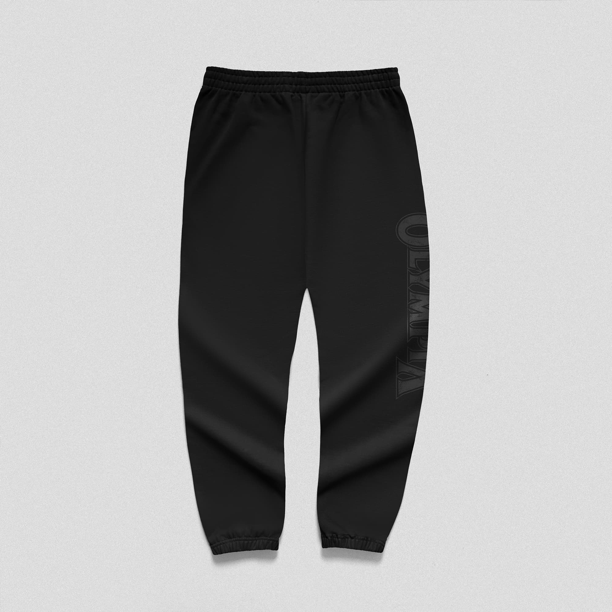 Back view of black Olympia joggers with vertical logo down right leg