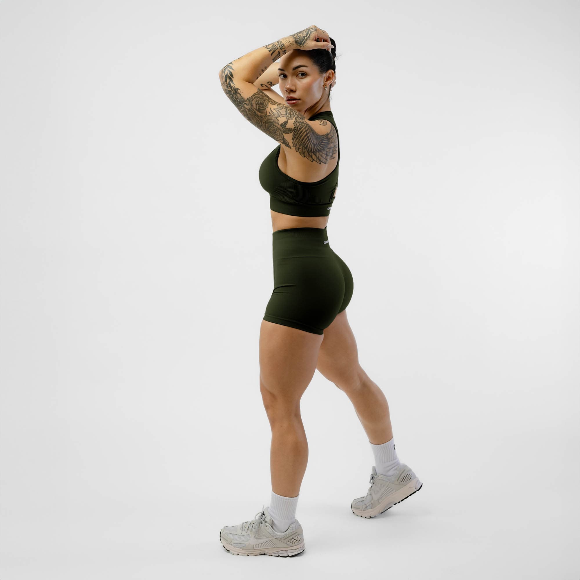 Athlete wearing the Ranger Green Halo Shorts full body shot