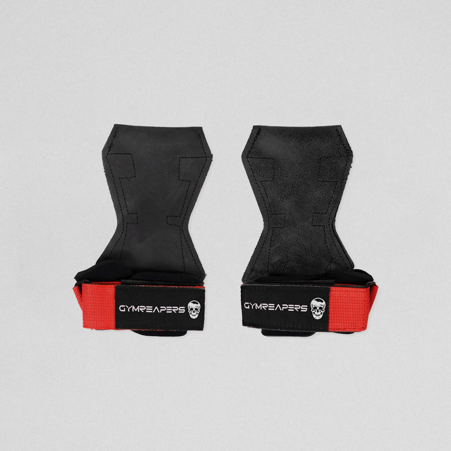 Gymreapers lifting grips red both flat and both having the velcro closed.