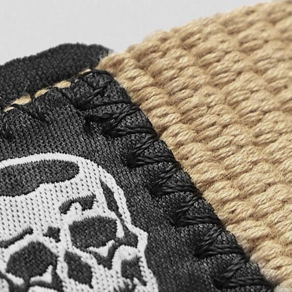 lifting straps desert sand skull close up