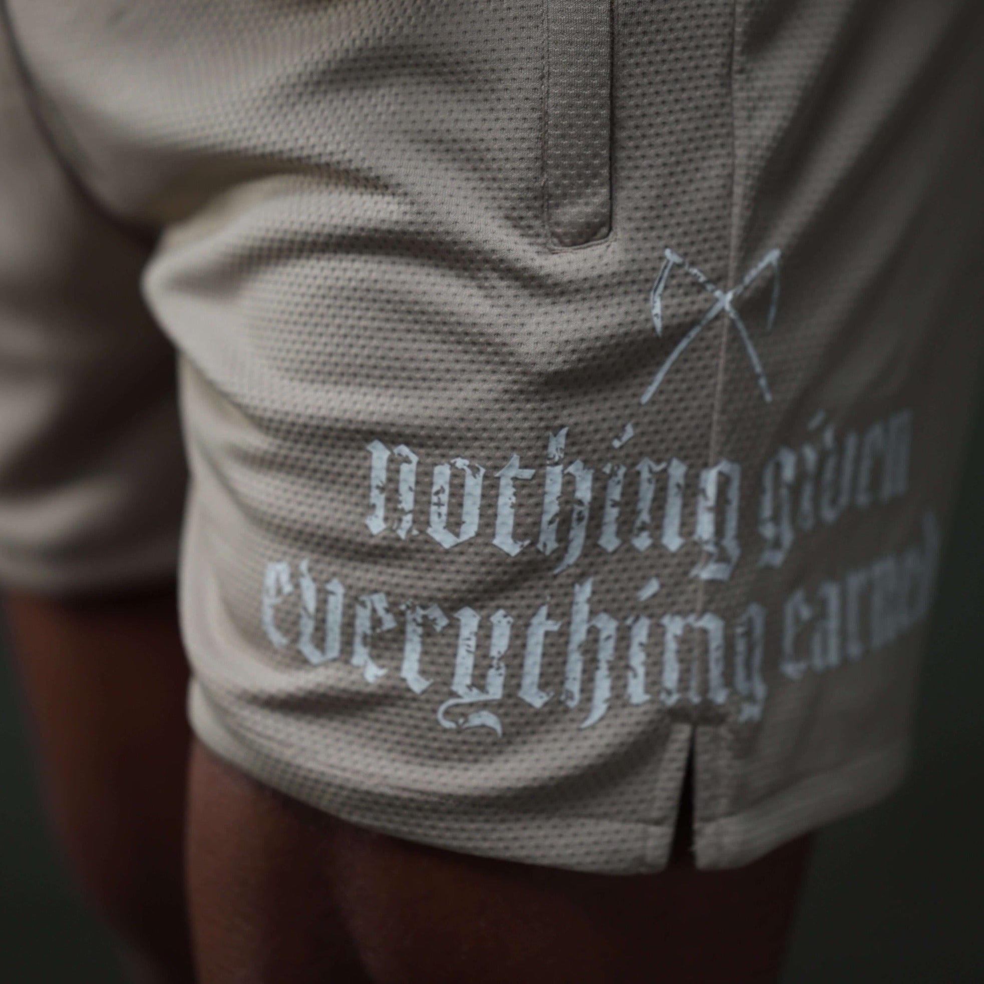 mantra shorts khaki studio close up