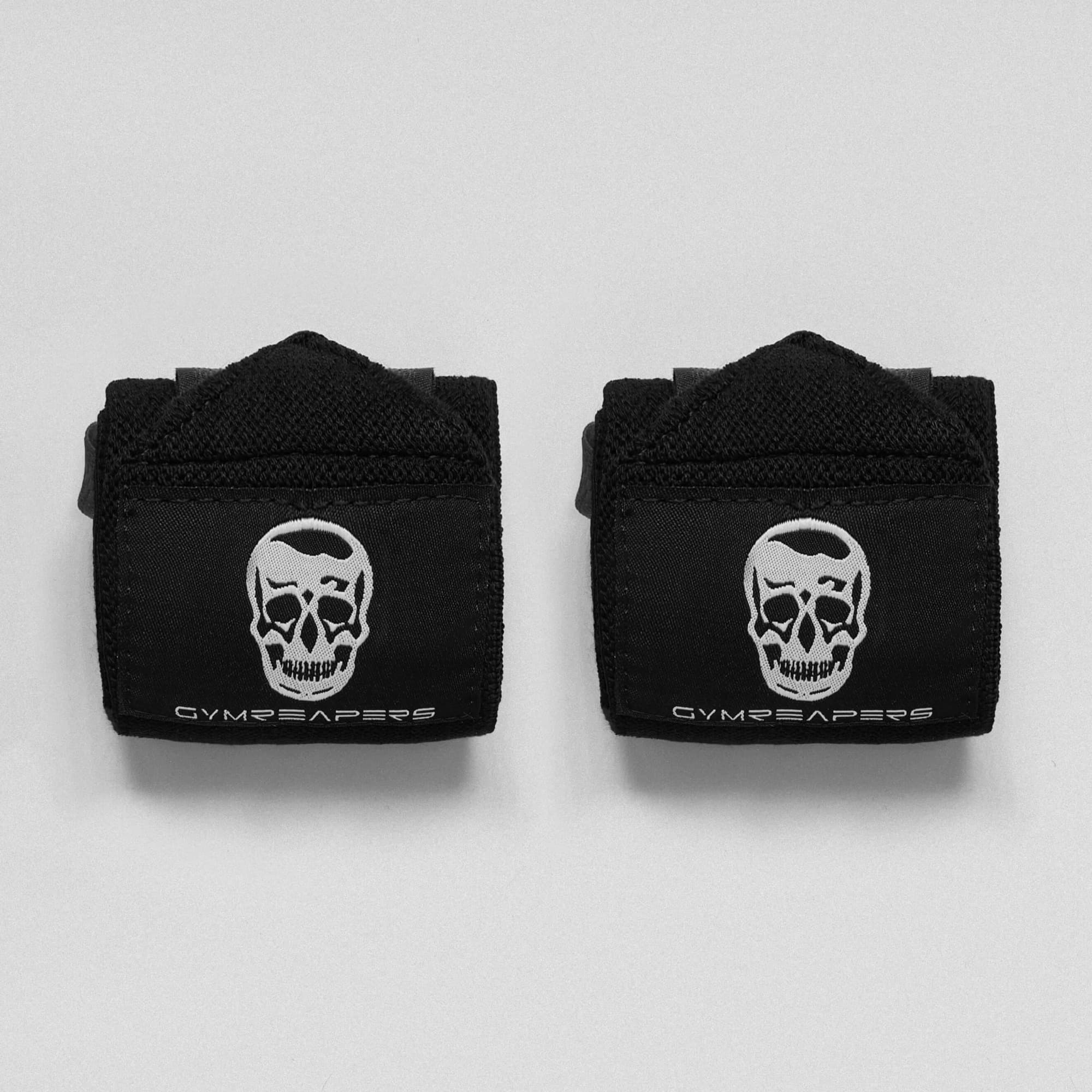 black and white wrist wraps lay flat